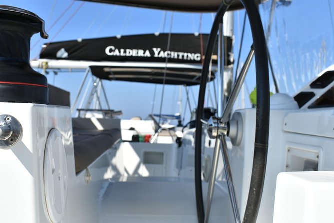 Santorini All-inclusive Private Catamaran Cruise - Nea Kameni hot springs: warm water, strong smell, simple fun
