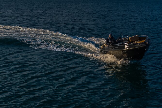 Santorini Boat Rental: License Free and Full or Half Day Options - The Boat, the Safety Briefing, and the License-Free Surprise