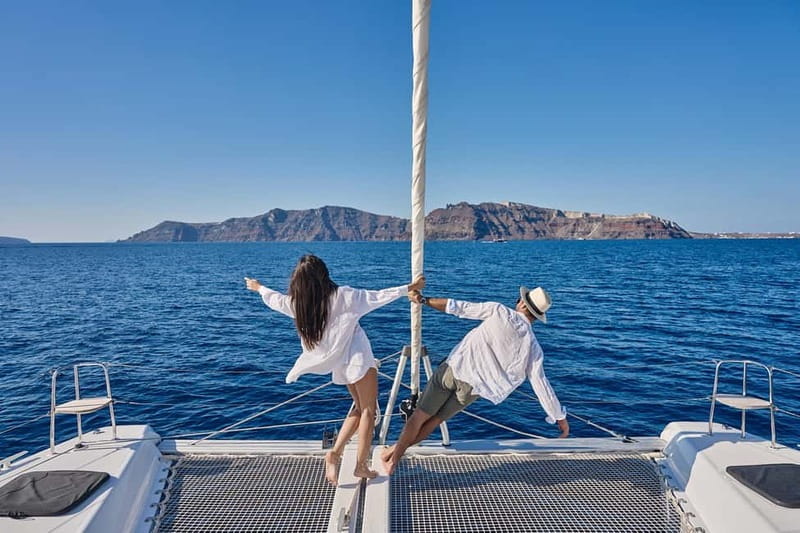 Santorini: Caldera Classic Catamaran Cruise w/ Meal & Drinks - Akrotiri Lighthouse and Indian Face Mountain: the calm sightseeing stretch