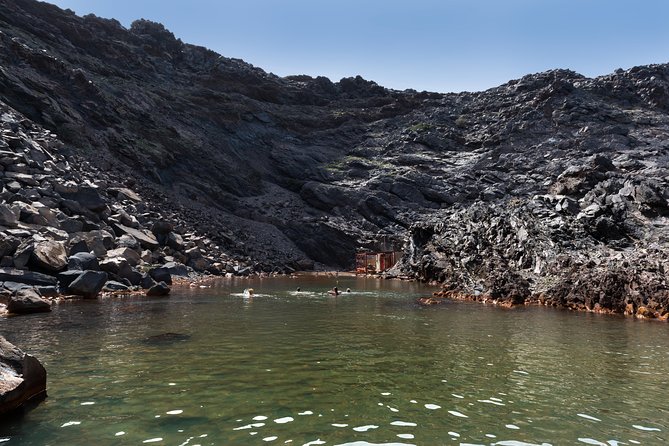 Santorini Caldera Cruise Tour (Volcano, Hot Springs, Thirassia) - Nea Kameni volcano hike: what the €5 fee buys, and how to handle the climb