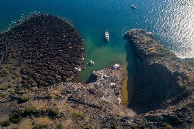 Santorini Caldera Morning Cruise With King Thiras Boat - Stop 2: Palea Kameni Hot Springs Swim Near the Waterline