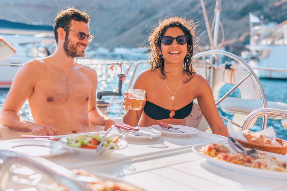 Santorini Caldera: Sunset Sailing Cruise with Meal - The cruise includes a true swim and snorkel in clear water