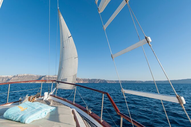Santorini Caldera Sunset Traditional Cruise with Meal and Drinks - Sailing the Volcano Area Without the Hiking