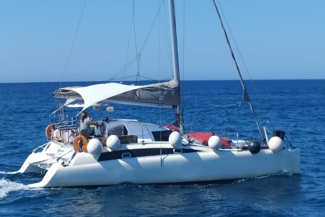 Santorini Catamaran Cruise – 5-Hour Private Sailing Experience - White Beach: a crystal-blue swim stop with a photo payoff