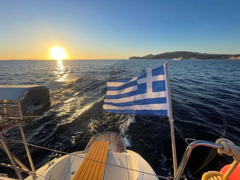 Santorini: Catamaran Cruise with Food and Drinks - Stop 1: Red Beach Swim—Volcanic Color Meets Real Water Time