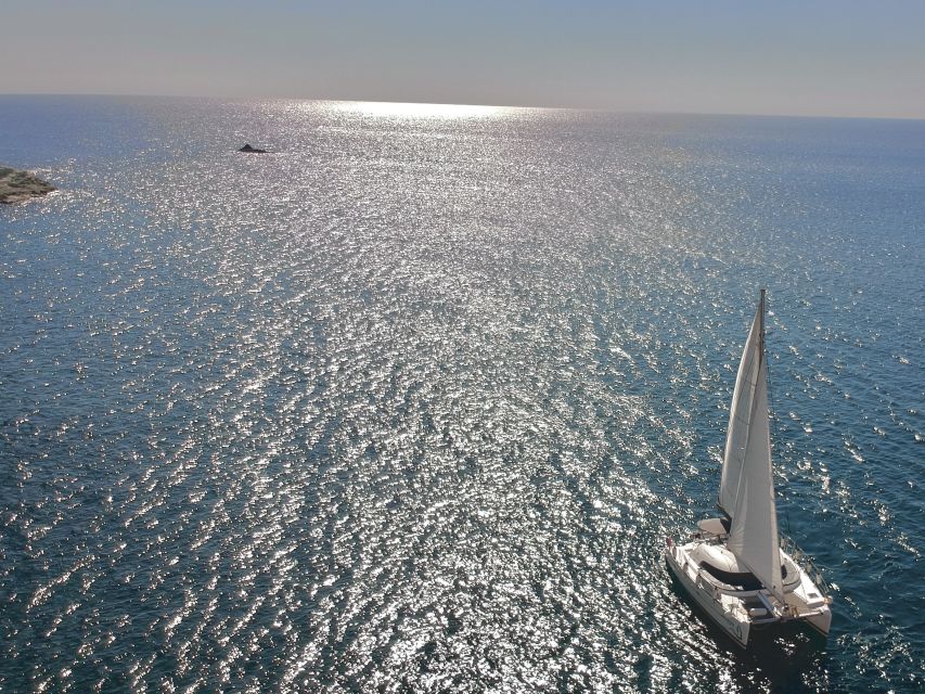 Santorini: Catamaran Cruise with Food and Drinks - Stop 2: White Beach Photo Stop—Short, Scenic, and No Swimming