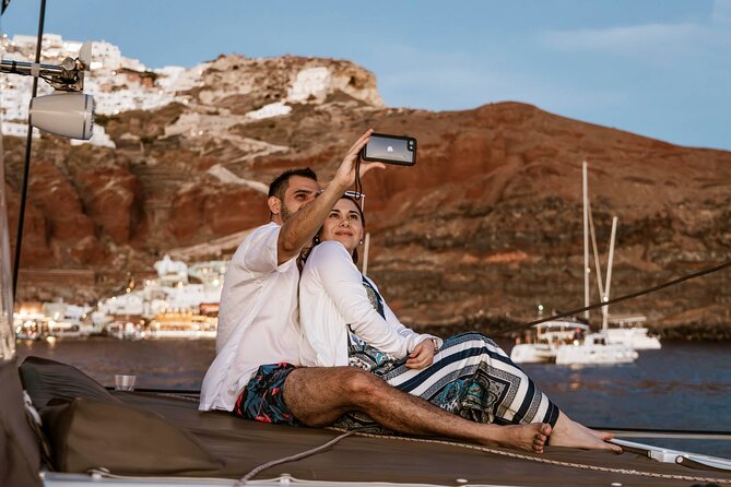 Santorini Catamaran Cruise with Greek Meal, Open-Bar and Sunset - Sunset Cruise: Finishing With the Famous View From the Water