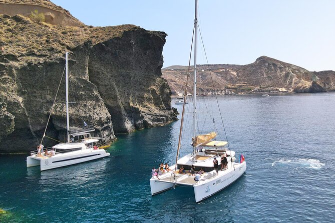 Santorini Catamaran Cruise: with Lunch, BBQ, Open Bar, Transfers - Drinks and BBQ on a catamaran: value you can feel