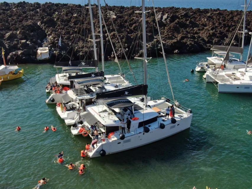 Santorini: Catamaran Cruise with Meal & Open Bar - Sunset Photo Moment: Why Watching from the Water Feels Different