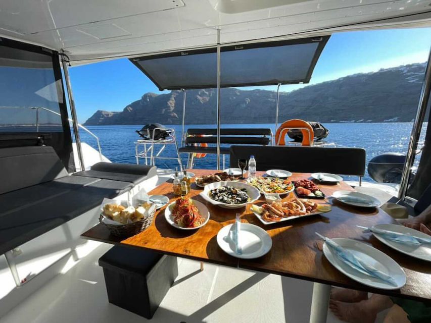 Santorini: Catamaran Cruise with Meal & Open Bar - Red Beach Stop: Snorkeling for Color and That “I’m in the Movie” Water