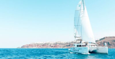 Santorini: Catamaran Tour with BBQ Meal and Unlimited Drinks - Hot Springs in the Caldera: Nea Kameni Swim Time