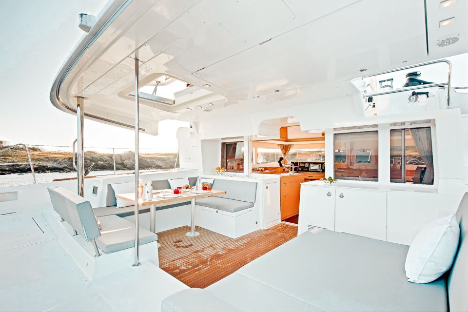 Santorini: Catamaran Tour with BBQ Meal and Unlimited Drinks - Sailing Past Volcanic Landmarks and the Oia Sunset Option