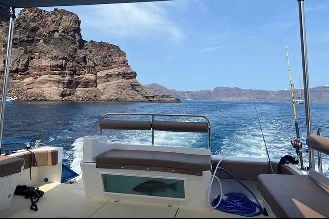 Santorini Fishing Private Cruise boat tour - BBQ, Snorkeling - Captain Makis and Elias: A pirate captain who actually fishes