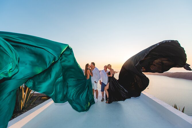 Santorini flying dress photo - Imerovigli option: blue domes and whitewashed cave vibes