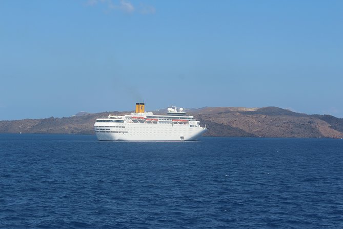 Santorini Full Day Tour - Thirassia: the underrated island break for lunch, beach time, and Manolas wandering