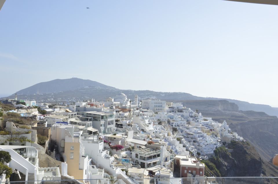 Santorini: Half-Day Sightseeing Tour with Hotel Pickup - Hotel Pickup in an Air-Conditioned Minivan: The Smart Start