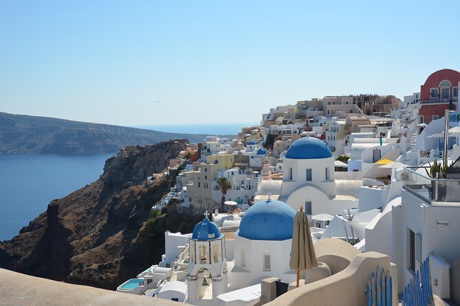 Santorini Highlights Small-Group Tour with Wine Tasting option - Oia Main Street: where your guide matters more than your camera