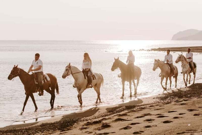 Santorini: Horseback Riding on the Black Sandy Eros Beach - Guide names you might meet: from Nick to Christina to Amber