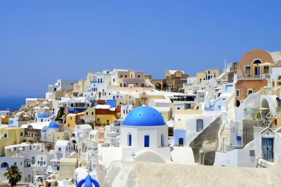 Santorini Island Bus Tour and Caldera Sunset Cruise - Pyrgos village: highest town vibes, churches, and Venetian edges