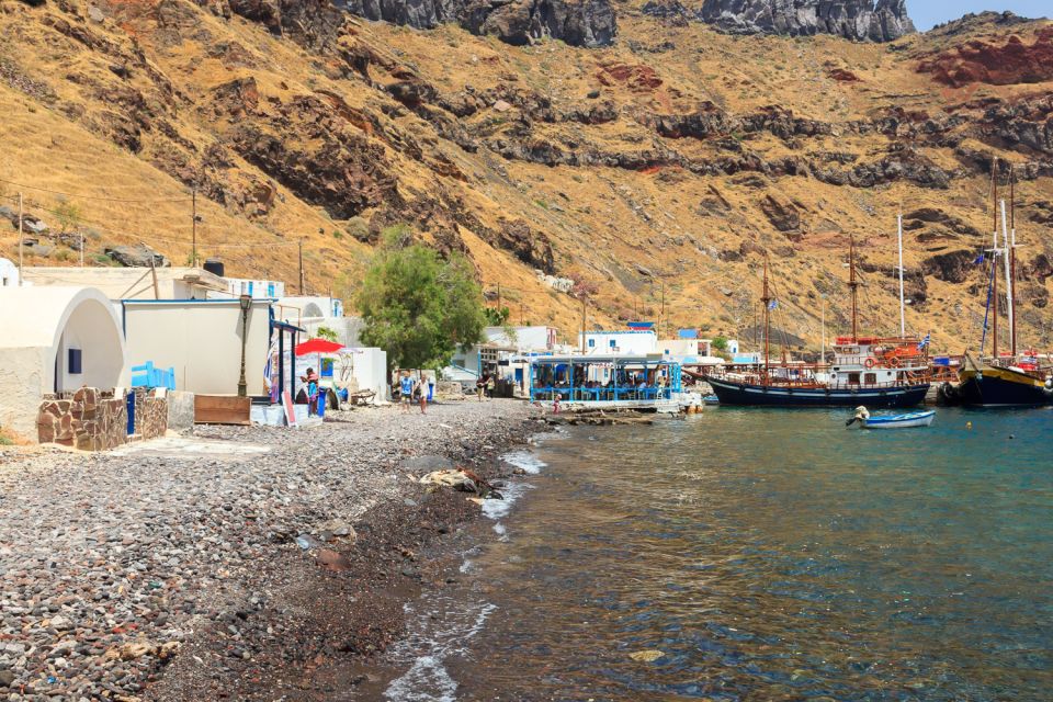 Santorini Island Bus Tour and Caldera Sunset Cruise - Palea Kameni thermal springs: sulfur water swim near 50 meters