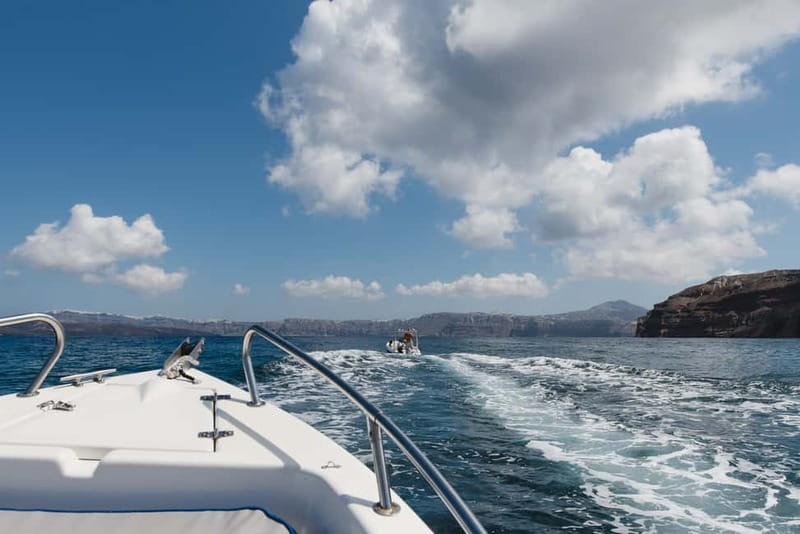 Santorini: License-Free Boat Rental with Ice, Water, & Fruit - Hot springs swim time: gear, comfort, and easy water access