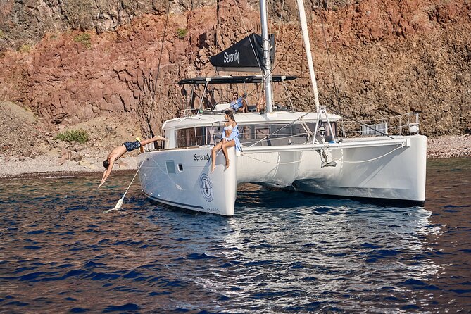 Santorini: Luxury Catamaran Cruise with Fresh Fish BBQ & Drinks - Nea Kameni Island: Snorkeling Time Plus Dinner on Board