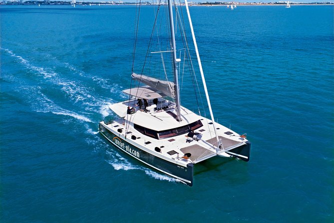 Santorini Luxury Catamaran Day Cruise with BBQ,drinks,transfer - Hotel pickup and the Ammoudi start: less hassle, more water time