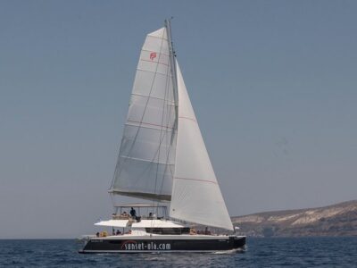 Santorini Luxury Catamaran Day Cruise with BBQ,drinks,transfer - Volcano and Palea Kameni sailing: sea-level views of the caldera