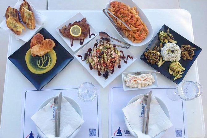 Santorini Luxury Catamaran Day Cruise with BBQ,drinks,transfer - The onboard experience: drinks, meal, music, and comfort