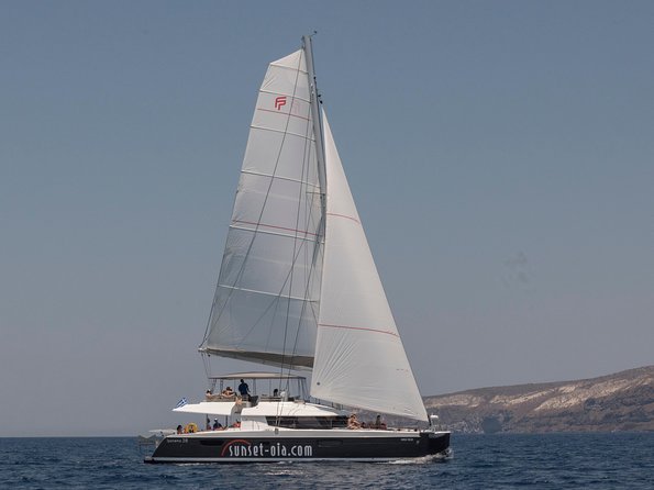 Santorini Luxury Catamaran Day Cruise with BBQ,drinks,transfer - Volcano and Palea Kameni sailing: sea-level views of the caldera