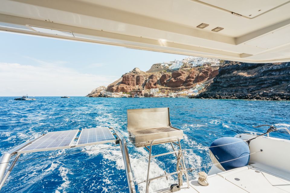 Santorini: Luxury Catamaran Day Trip with Meal and Open Bar - White Beach sea caves snorkeling: the part that feels extra special