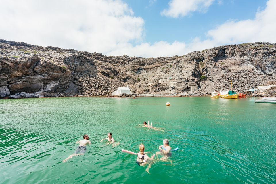 Santorini: Luxury Catamaran Day Trip with Meal and Open Bar - Volcanic hot springs: warmth, timing, and what to wear