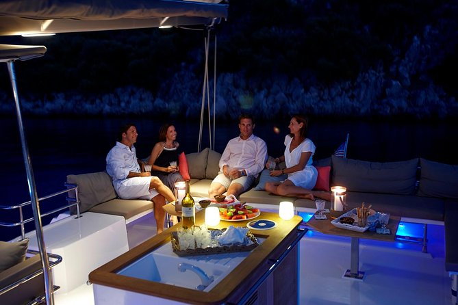 Santorini Luxury Catamaran Sunset Cruise with BBQ, Drink and Transfer - Red Beach and White Beach Snorkeling: Swim Windows With Snorkel Gear