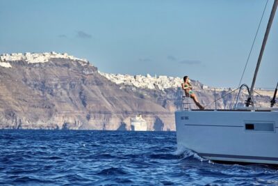 Santorini Luxury Sailing Catamaran Cruise with BBQ, Drinks and Transfer - Red Beach swim slot: quick color, solid snorkeling time