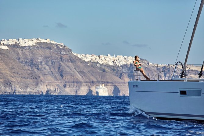 Santorini Luxury Sailing Catamaran Cruise with BBQ, Drinks and Transfer - Red Beach swim slot: quick color, solid snorkeling time