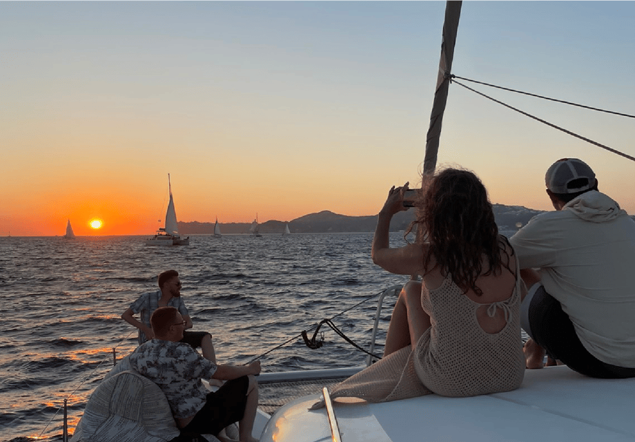 Santorini: Luxury Sunset Cruise with Dinner, BBQ, and Drinks - Crew and service: why names like Natalia and Helen show up