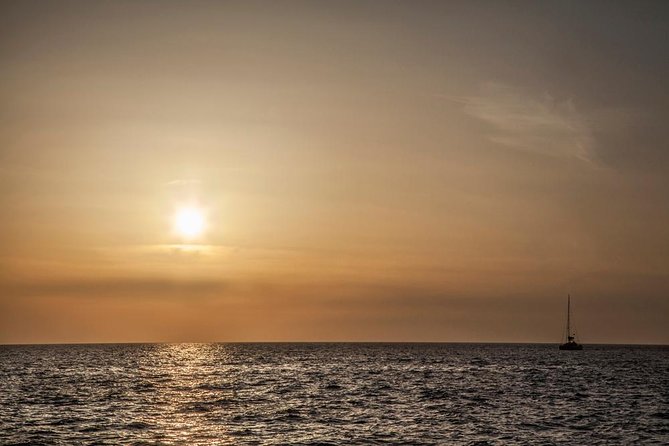 Santorini: Motor Yacht Sunset Cruise with 5-Course Dinner - Stop 2: Mesa Pigadia Beach—snorkeling where the water is the star