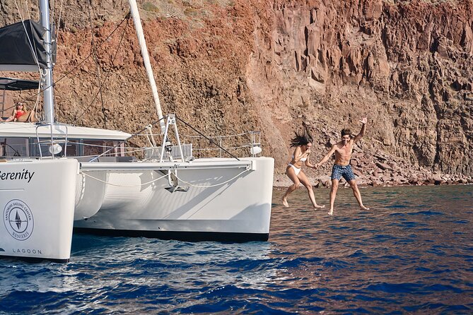 Santorini Oia: Luxury Sunset Cruise with Fresh Fish BBQ & Drinks - The volcano and Nea Kameni: black rocks, sulfur waters, and the float-factor