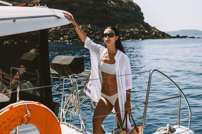 Santorini Oia: Private Sunset Catamaran Cruise with BBQ & Drinks - Mesa Pigadia: the secluded black-beach swim that feels off the main road
