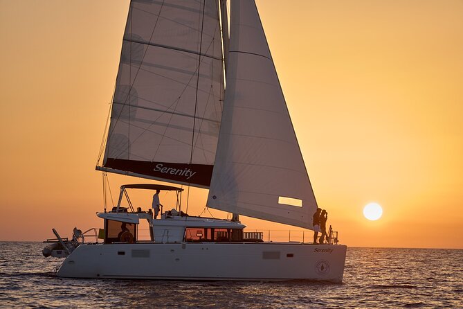 Santorini Oia: Private Sunset Catamaran Cruise with BBQ & Drinks - White Beach: boat-only access and changing colors