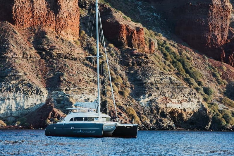 Santorini: Private Catamaran Cruise with BBQ Meal and Drinks - Thirassia and Manolas: A quieter side of Santorini