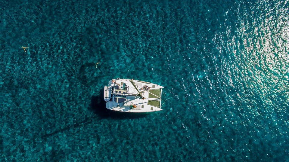 Santorini: Private Catamaran Cruise with Food & Drinks - Private catamaran on the Santorini Caldera: what makes it feel special