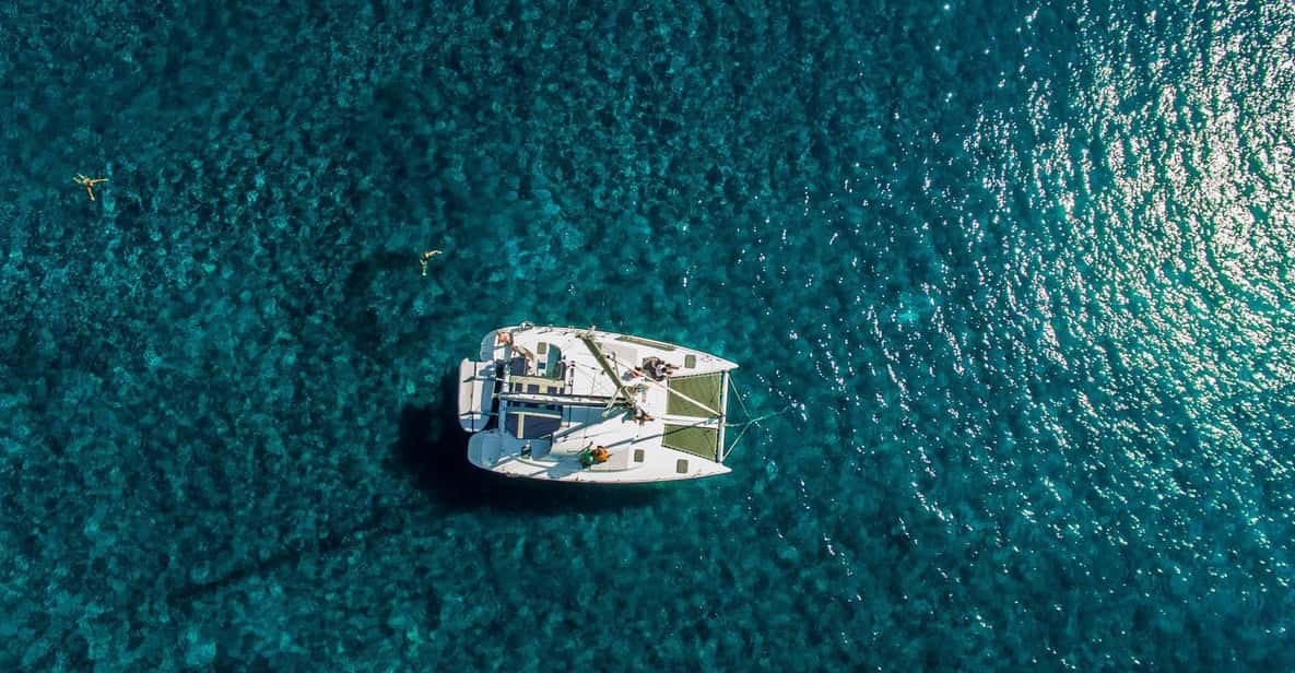 Santorini: Private Catamaran Cruise with Food & Drinks - Volcano area and hot springs: what you’ll actually do at Palea/Nea Kameni