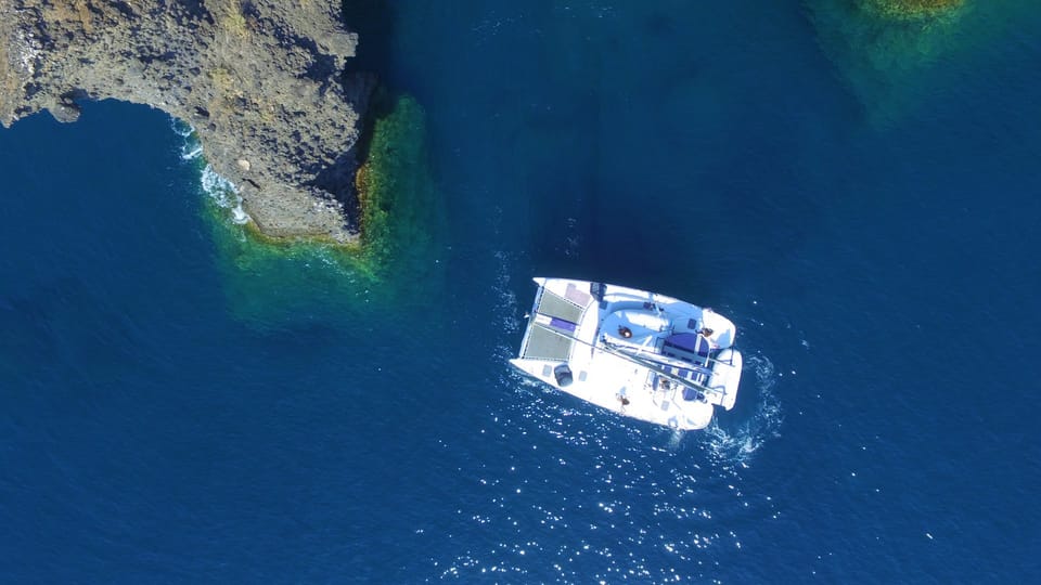 Santorini: Private Catamaran Cruise with Food & Drinks - Mésa Pigádia swim and snorkeling: where the water time feels longest