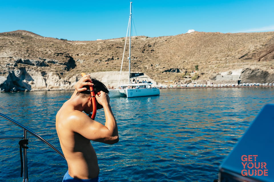 Santorini: Private Catamaran Tour with BBQ Meal and Drinks - The Boat Experience: Sundeck Space, Indoor Comfort, and Real Service