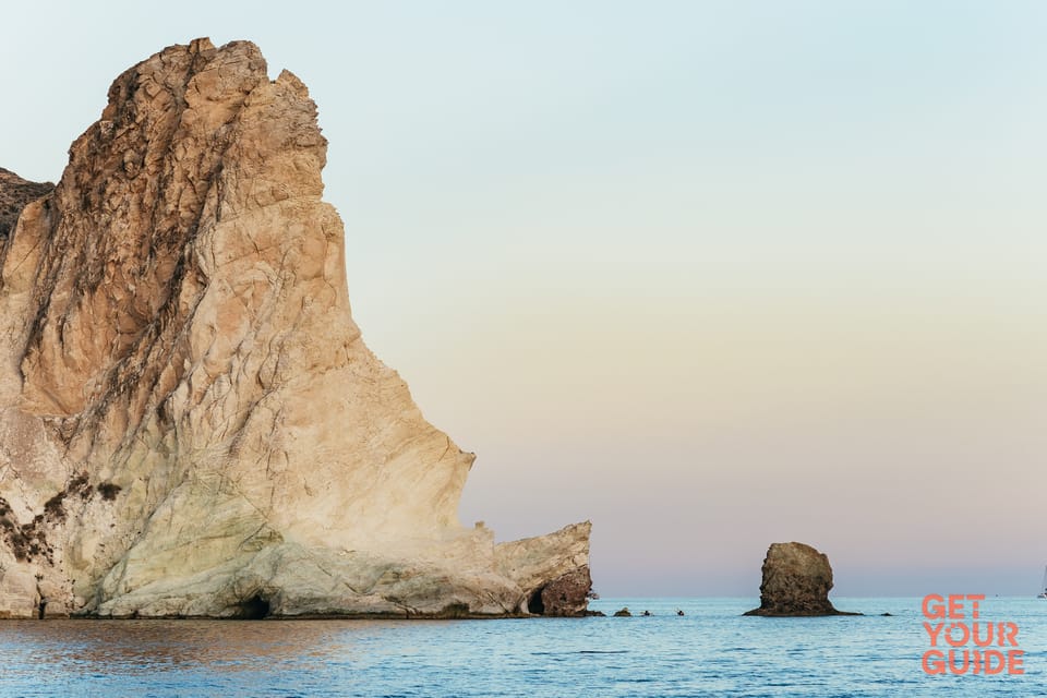 Santorini: Private Catamaran Tour with BBQ Meal and Drinks - Indian Rocks and the Venetian Lighthouse: Caldera Views With Good Context