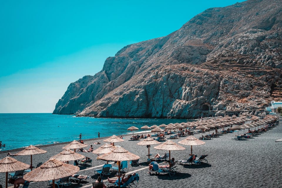 Santorini: Private Customizable Tour with Flexible Lenghts - Black sand beach time: relaxing, but with weather in mind