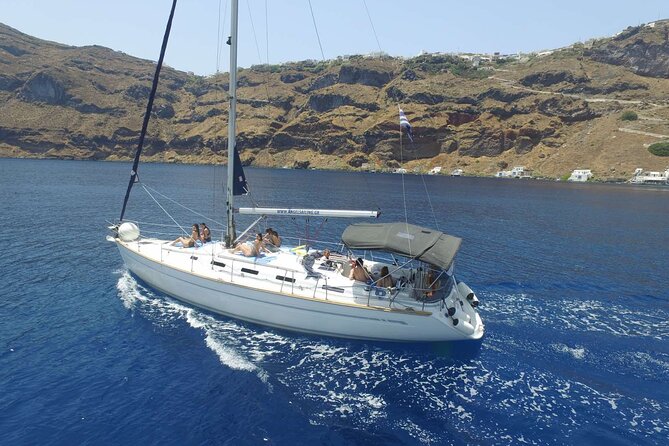 Santorini Private Daytime Sailing Cruise with Meal, Drinks &Transfer included - Red and White Beaches: Quick Photos, Big Personality
