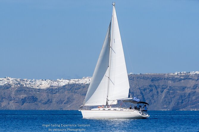 Santorini Private Daytime Sailing Cruise with Meal, Drinks &Transfer included - Captain George and the Crew: Where the Experience Becomes Yours