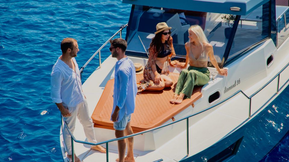Santorini: Private Diamond 36 Motor Yacht Caldera Cruise - Fira on the water: BBQ, Greek starters, and local wine